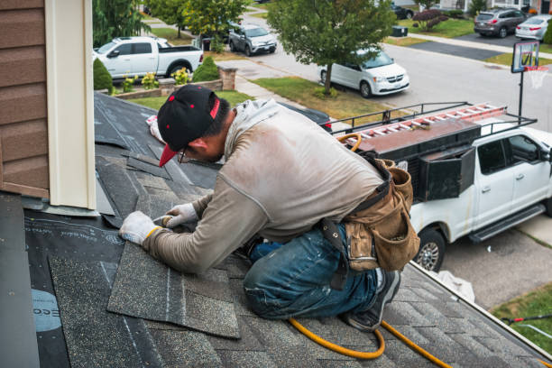 Professional Storm Damage Roof Repair technician working in Woodsboro, MD
